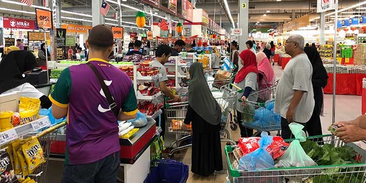 Wary consumers rein in spending